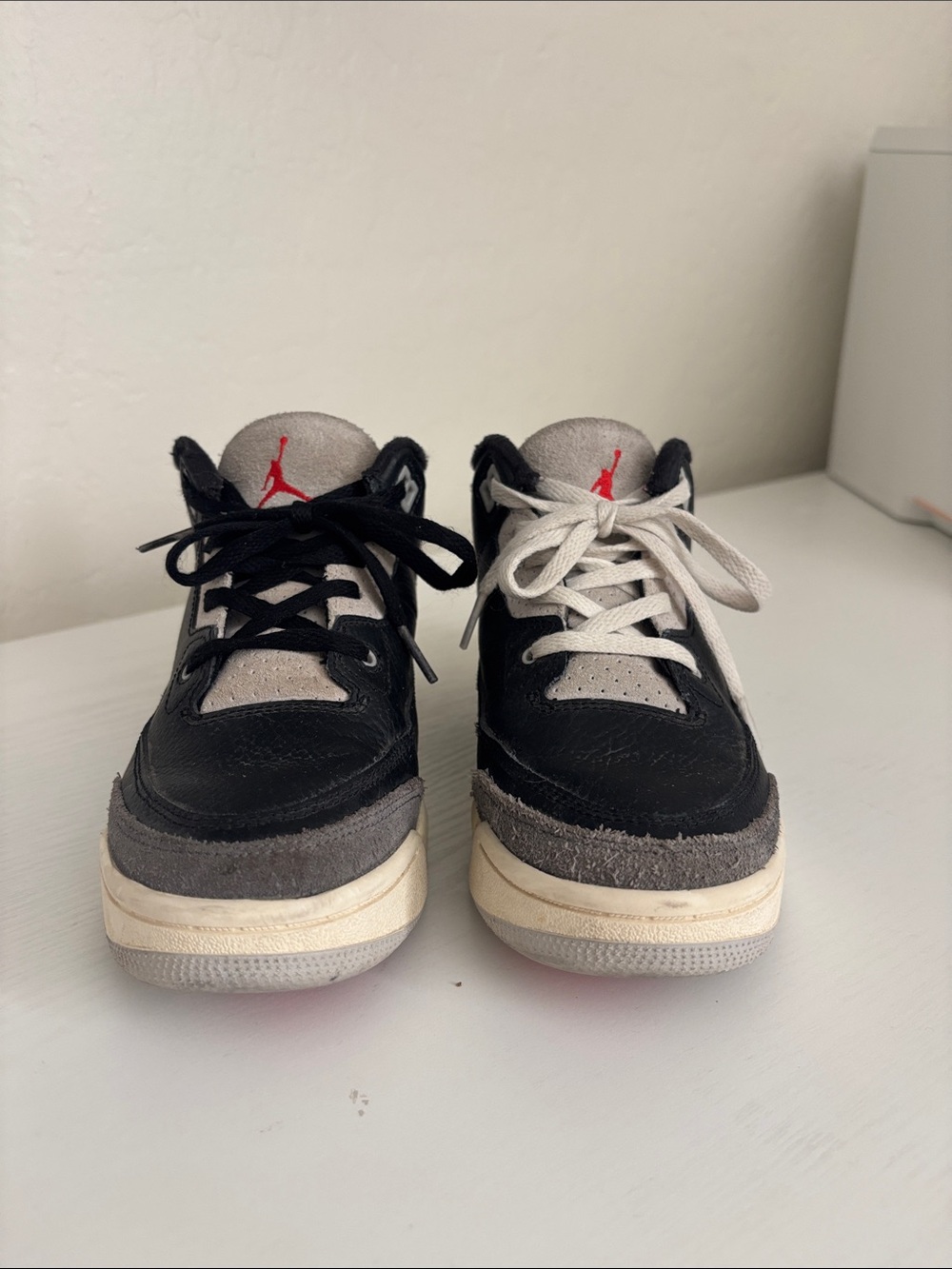 Jordan Kids Black and Gray Sneakers with Red Logo